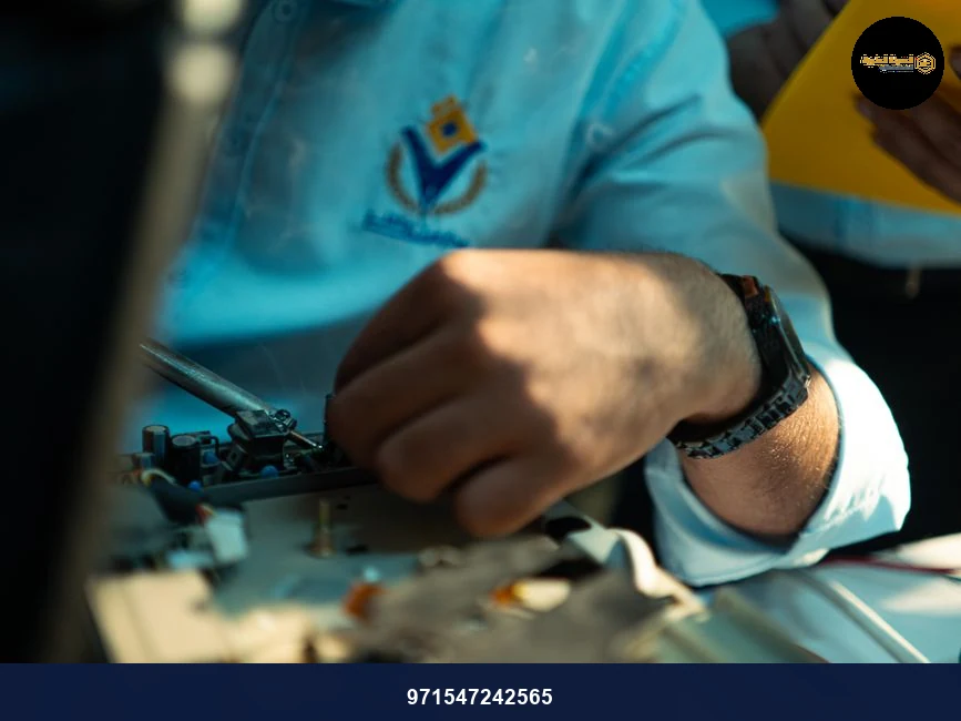 A detailed close-up of a technician working on machinery, highlighting skill and precision.