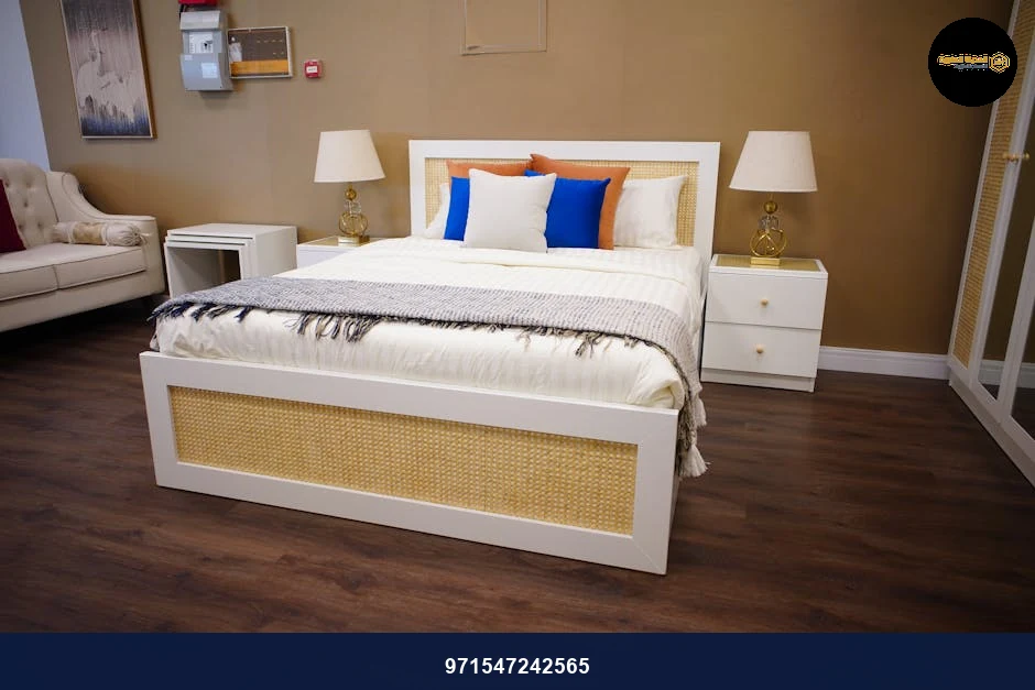 Elegant modern bedroom with luxury furnishings, neutral tones, and warm lighting.
