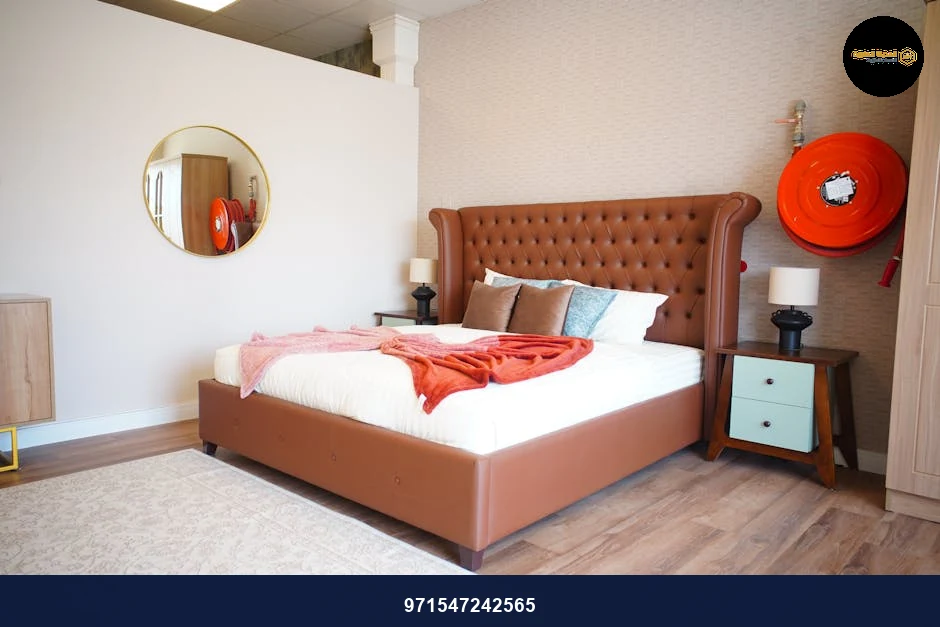 Explore a modern bedroom with luxurious decor, featuring a tufted headboard and stylish accents.