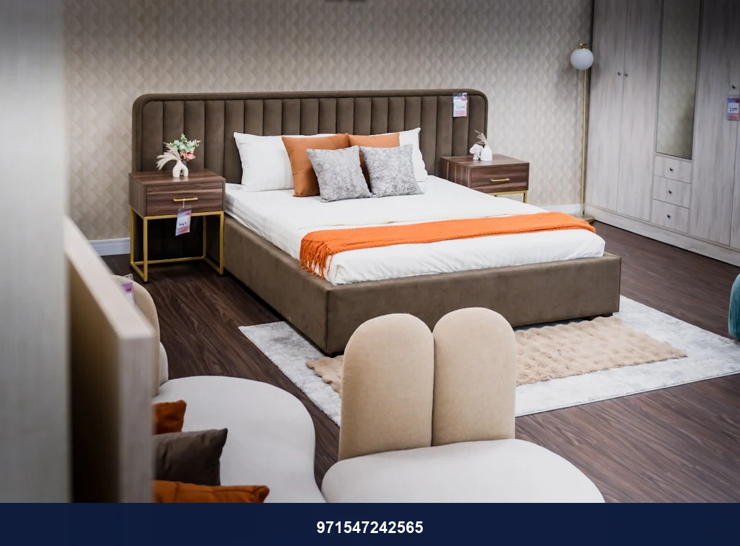 A well-styled bedroom displaying furniture and decorations.