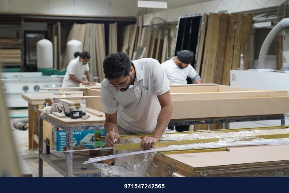 Craftsmen portraying precision and skill in a Dubai carpentry workshop.