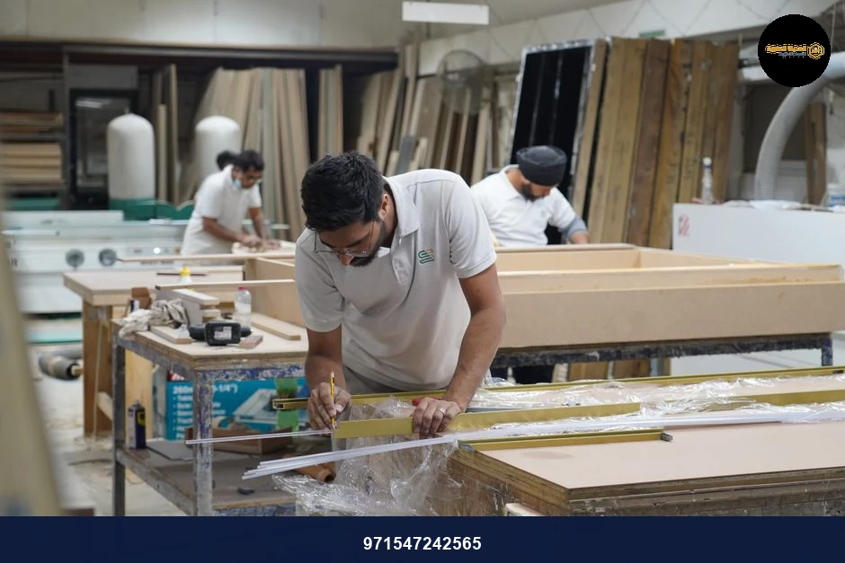 Craftsmen portraying precision and skill in a Dubai carpentry workshop.
