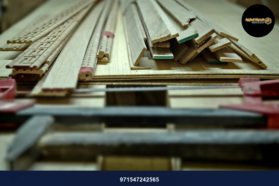 Close-up of woodworking tools and wooden planks on a workbench in Fès, Morocco.