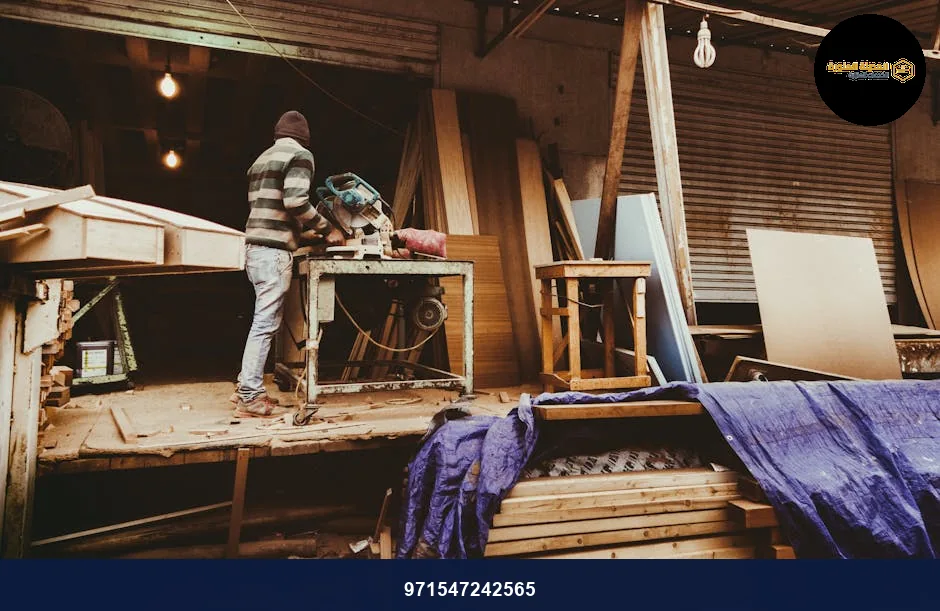 Carpenter focused on woodworking inside a cozy, rustic workshop. Carpenter focused on woodworking inside a cozy, rustic workshop.