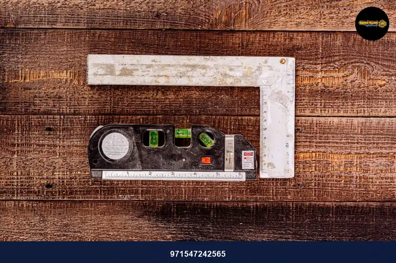 Top view of carpenter's measuring tools on rustic wooden surface, ideal for construction concepts.