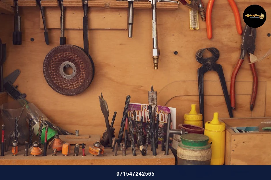 A variety of carpentry tools and equipment neatly arranged in a traditional Mexican workshop.