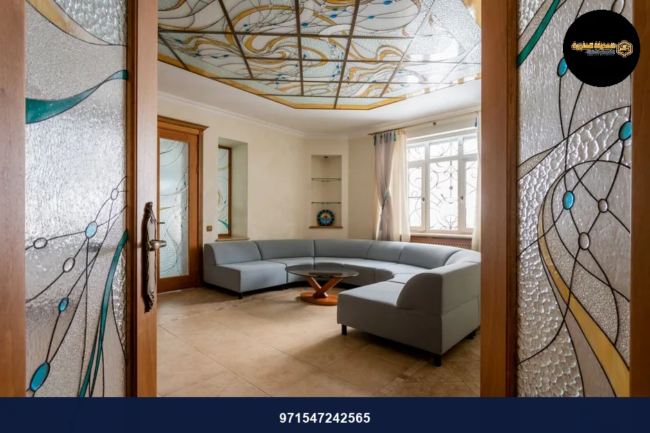 Elegant living room featuring a stained glass ceiling and modern interior design. Elegant living room featuring a stained glass ceiling and modern interior design.