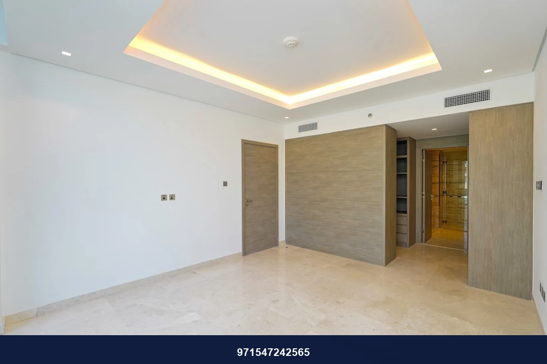An empty room with white walls and a white ceiling