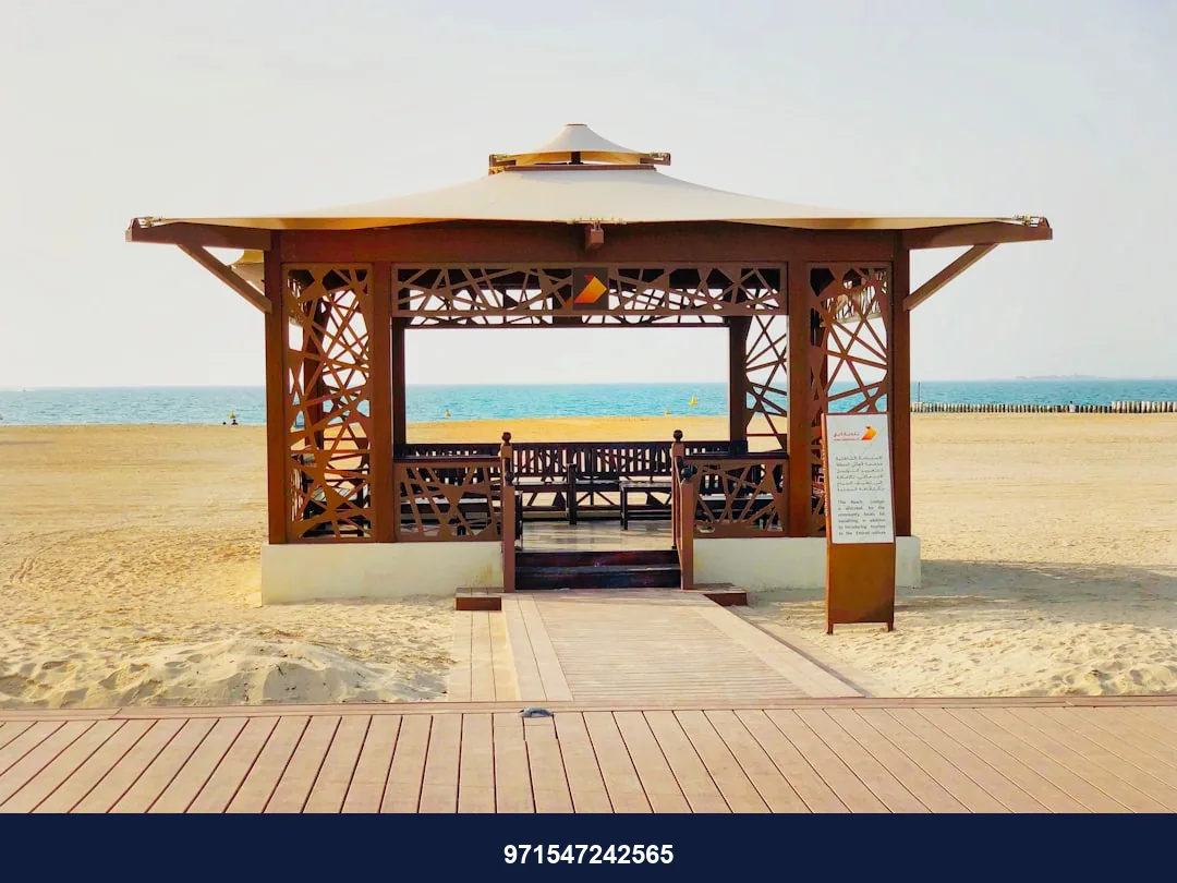 brown wooden gazebo on beach during daytime