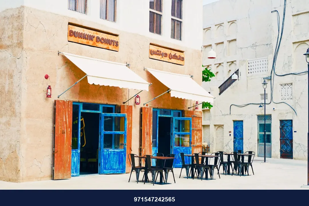tables and chairs placed outside building